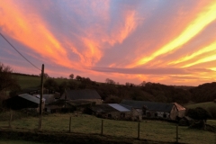 Sunset at Pullham Farm Twitchen: Photo by Helen Smith